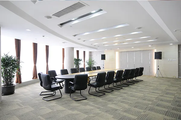An image showing a clean stylish modern conference room